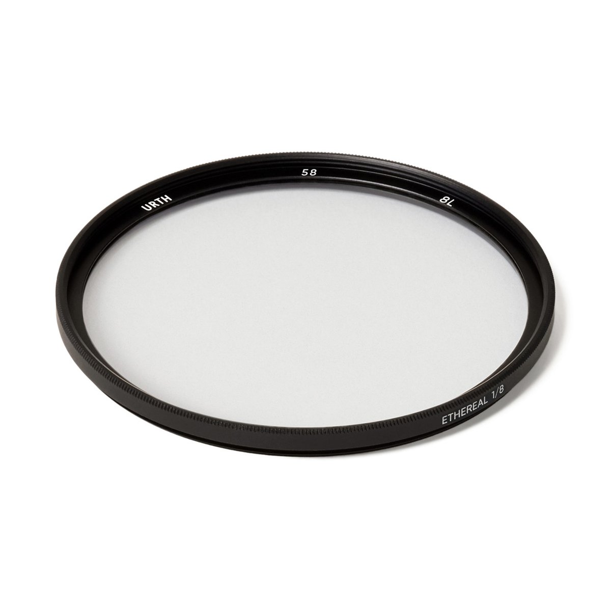 Urth 58mm Ethereal ⅛ Black Mist Objektivfilter (Plus+) - Draufsicht: Urth Ethereal 1/8 58mm Kamerafilter mit Beschriftung.
