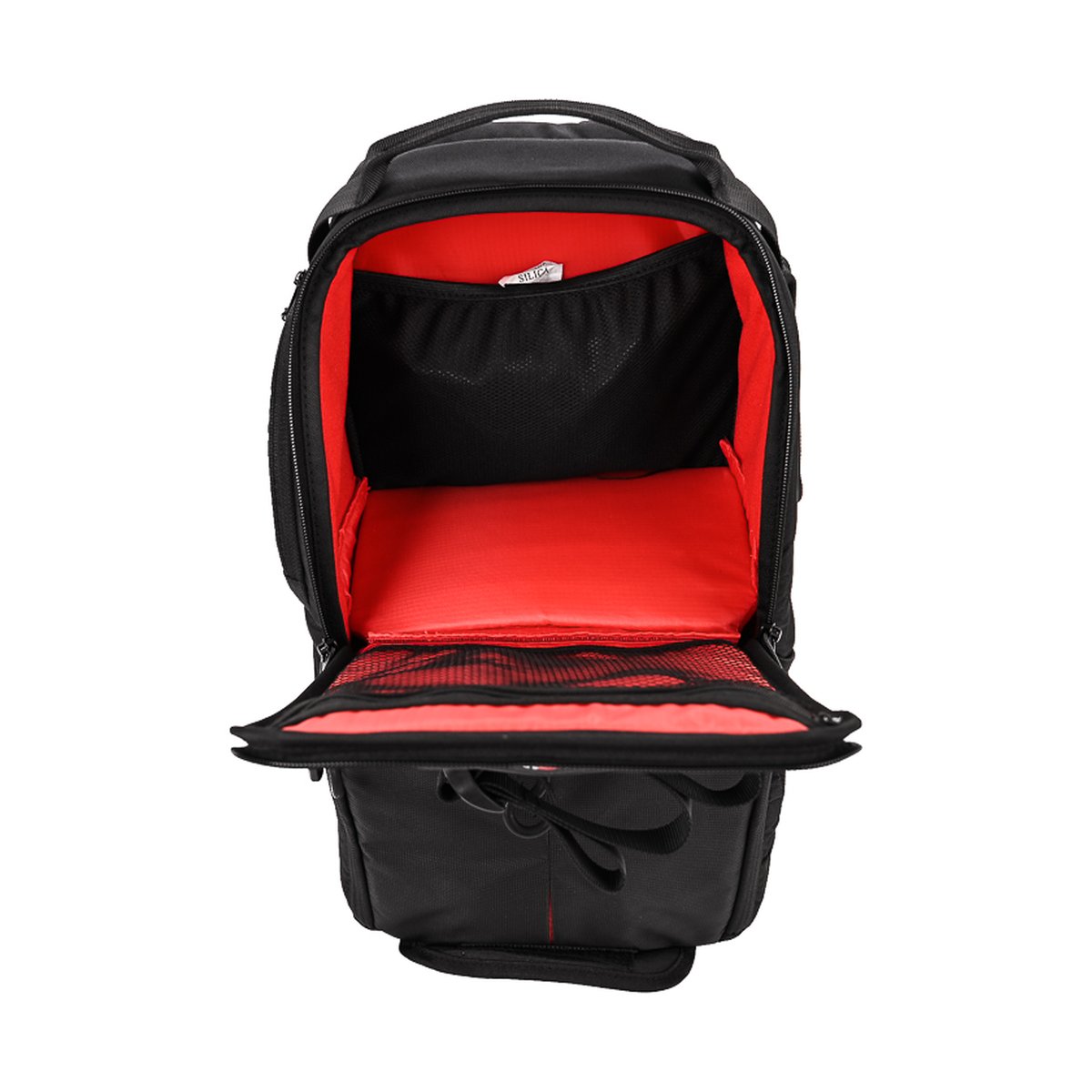 Caruba Skydex 10 - Detailansicht: Geöffnete Fächer eines schwarzen Rucksacks mit rotem Innenfutter und Netztaschen.