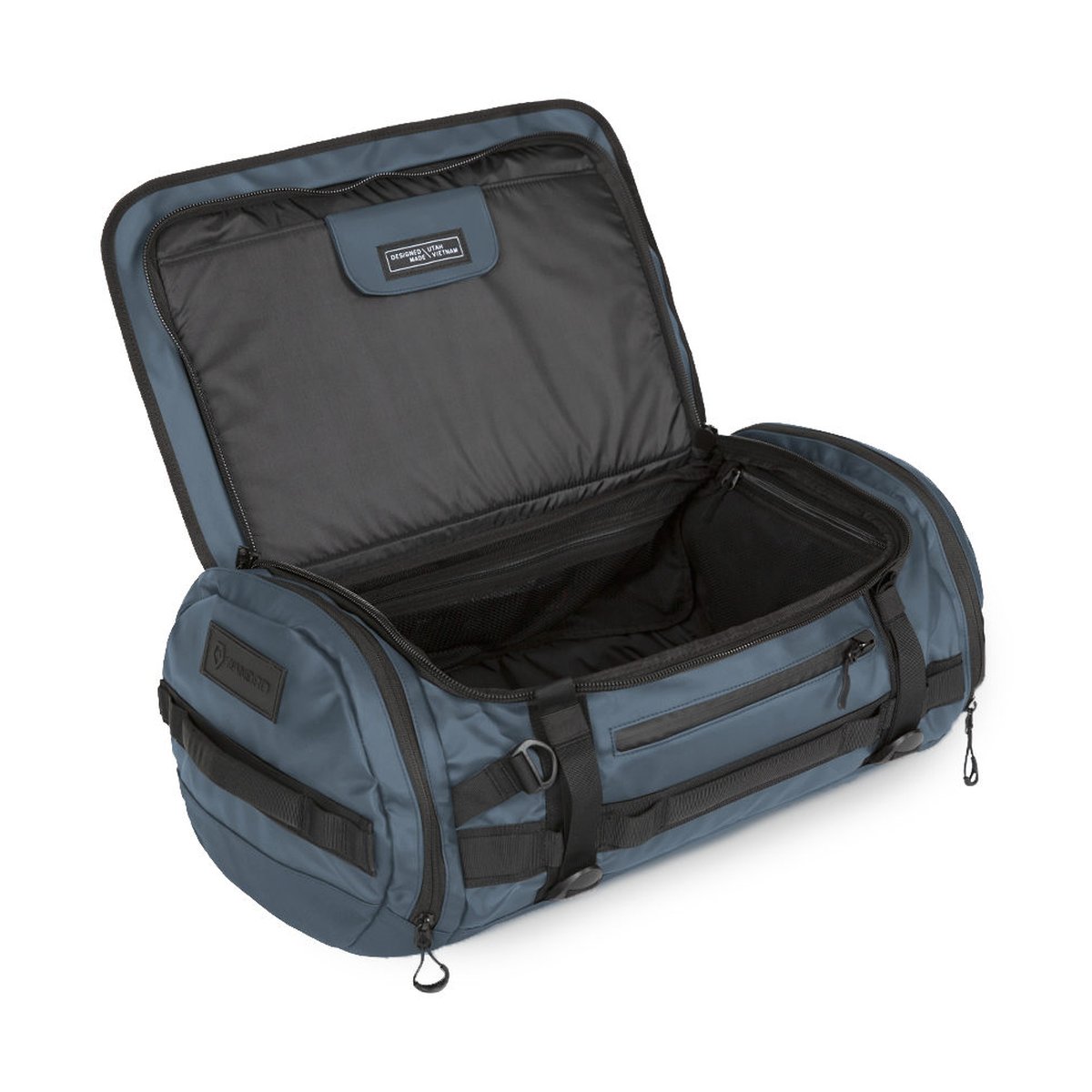 WANDRD HEXAD CARRYALL DUFFEL 40-Liter Aegean Blue - Geöffnete Duffle-Tasche zeigt Innenbereich mit Hauptfach und Netztaschen WANDRD HEXAD CARRYALL DUFFEL 40-Liter Aegean Blue - Geöffnete Duffle-Tasche zeigt Innenbereich mit Hauptfach und Netztaschen