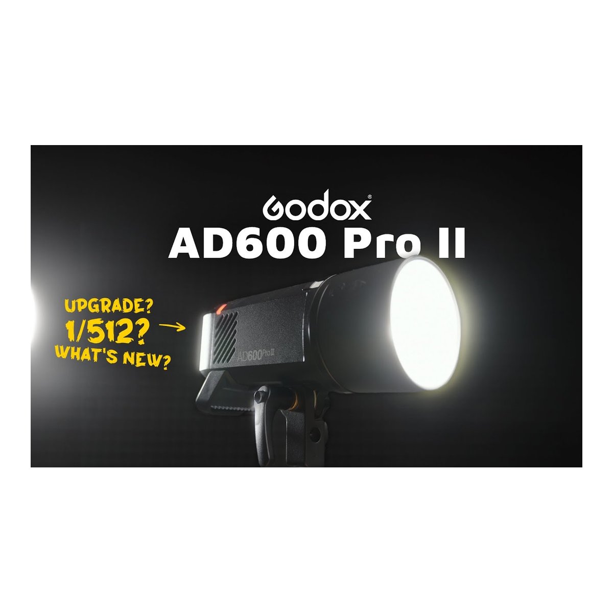Godox Witstro AD600Pro II - Frontansicht des Godox AD600 Pro II Studioblitzes, leuchtend, mit Text zu Upgrade & Neuheiten.