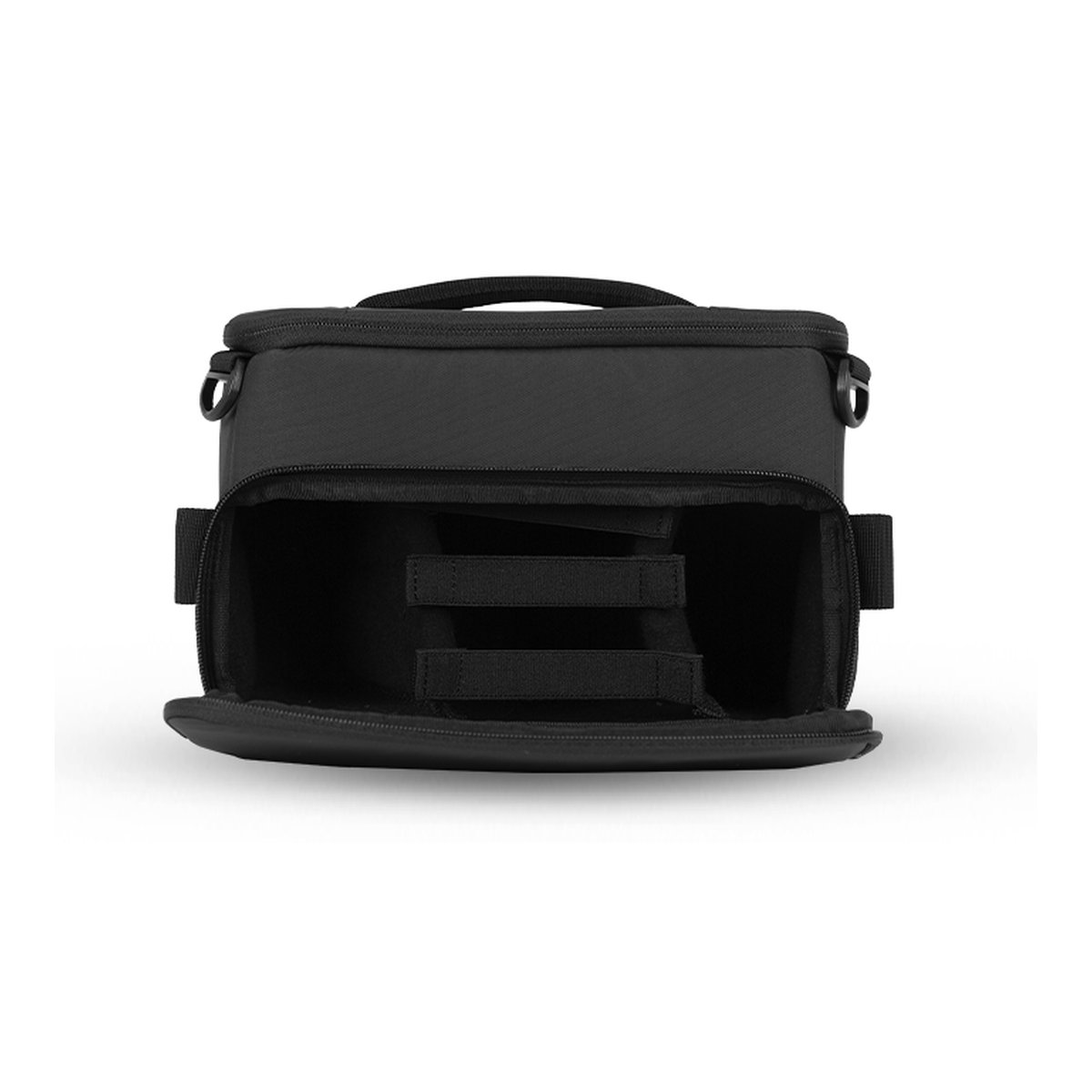 WANDRD Camera Cube Mini+ (31 Liter PRVKE) - Innenansicht einer geöffneten schwarzen Tasche mit verstellbaren Trennwänden