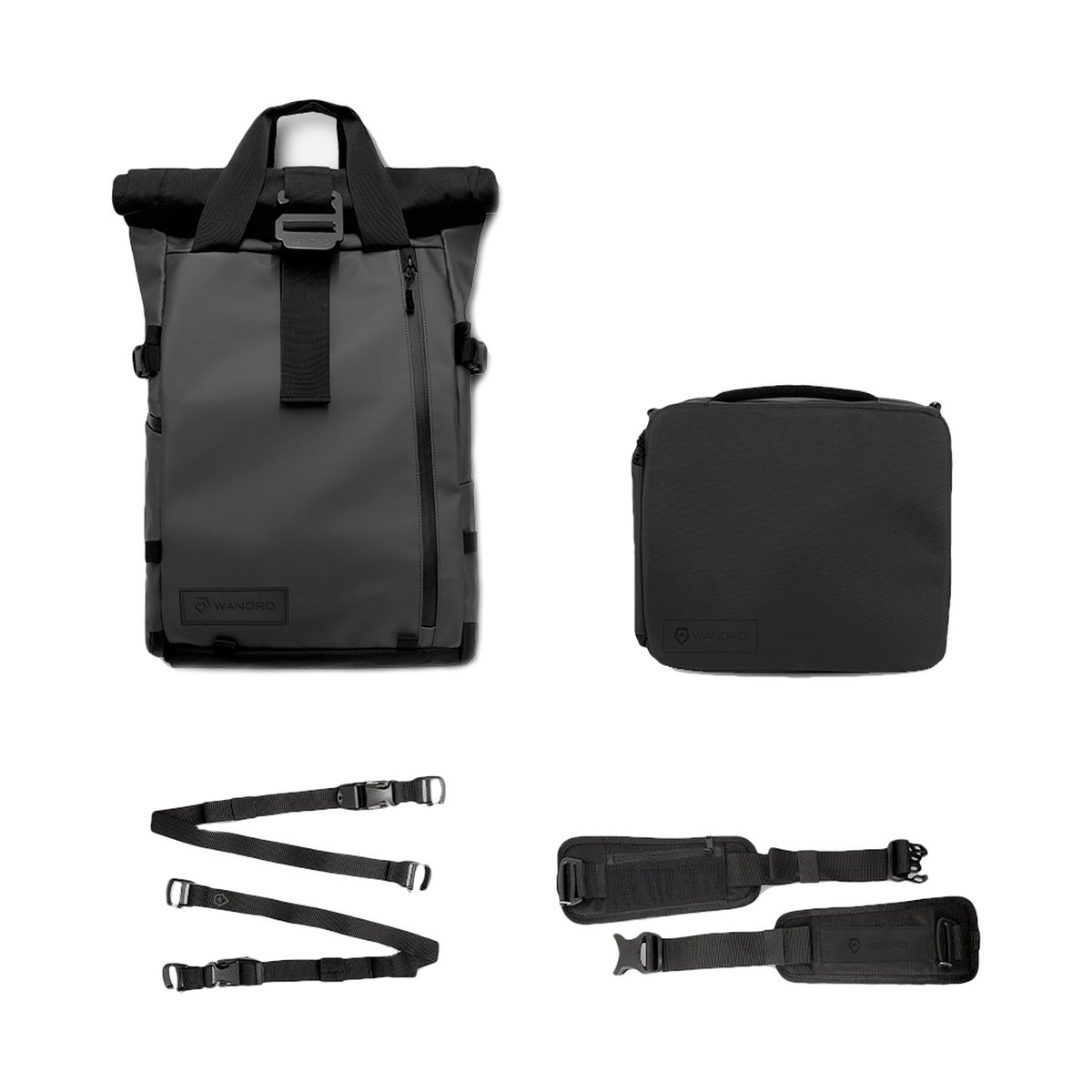 WANDRD PRVKE 31-Liter Black Photo Bundel V3 - Lieferumfang: Dunkelgrauer Rolltop-Rucksack, Zubehör-Tasche, zwei Befestigungsgurte und zwei gepolsterte Trageriemen.