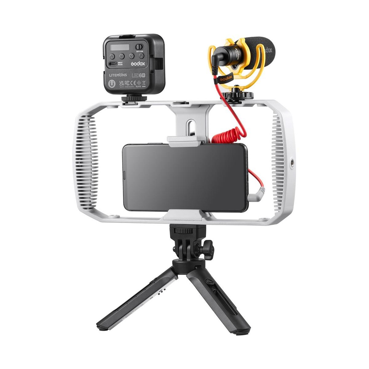 Godox Vlogging Set VK1-AX - Komplettes Vlogging-Setup mit Smartphone, Godox LED-Licht, Mikrofon und Tischstativ.