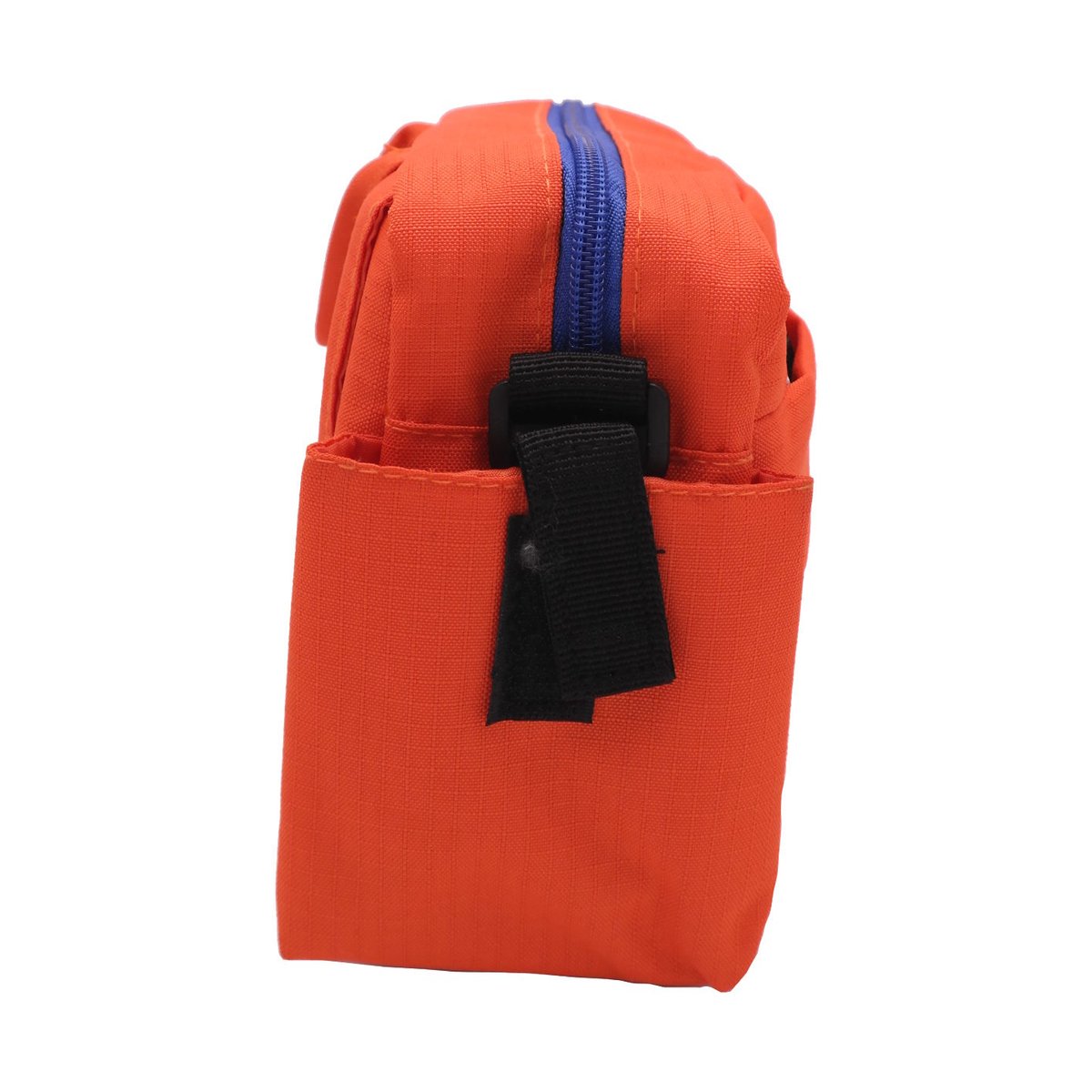 Caruba Compex 100 Orange - Seitenansicht der orangefarbenen Tasche mit blauem Reißverschluss und schwarzer Befestigungsschlaufe. Caruba Compex 100 Orange - Seitenansicht der orangefarbenen Tasche mit blauem Reißverschluss und schwarzer Befestigungsschlaufe.