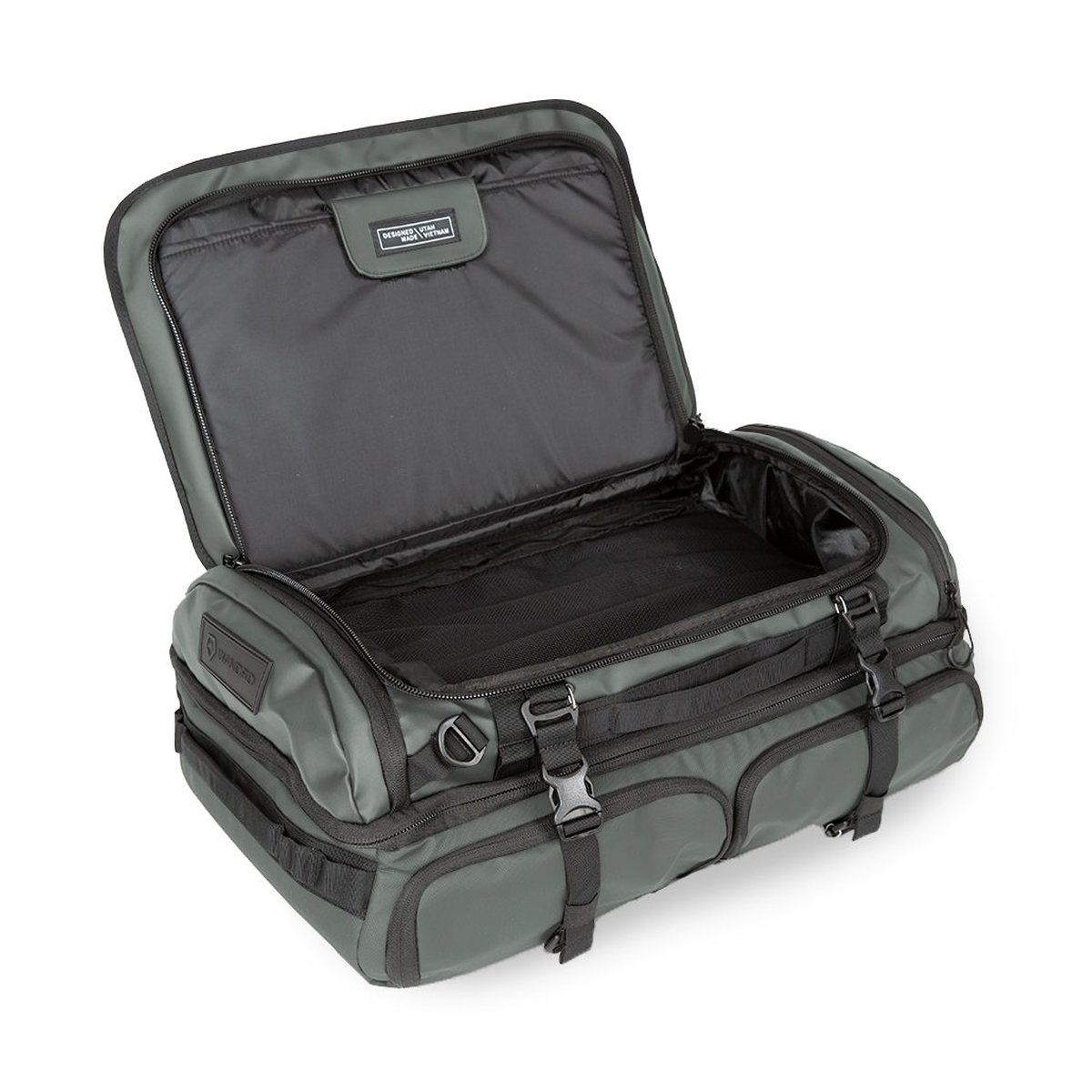 WANDRD HEXAD ACCESS DUFFEL Wasatch Green - Innenansicht des geöffneten Hauptfachs der Reisetasche WANDRD HEXAD ACCESS DUFFEL Wasatch Green - Innenansicht des geöffneten Hauptfachs der Reisetasche
