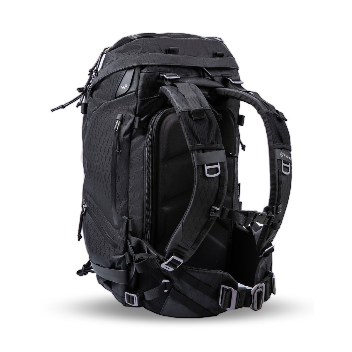 F-Stop DuraDiamond Tilopa Essentials-Bundle - Anthrazit - Rucksack: Schrägansicht von hinten-rechts, zeigt Rückensystem, Schultergurte, Hüftgurt und H2O-Fach. F-Stop DuraDiamond Tilopa Essentials-Bundle - Anthrazit - Rucksack: Schrägansicht von hinten-rechts, zeigt Rückensystem, Schultergurte, Hüftgurt und H2O-Fach.