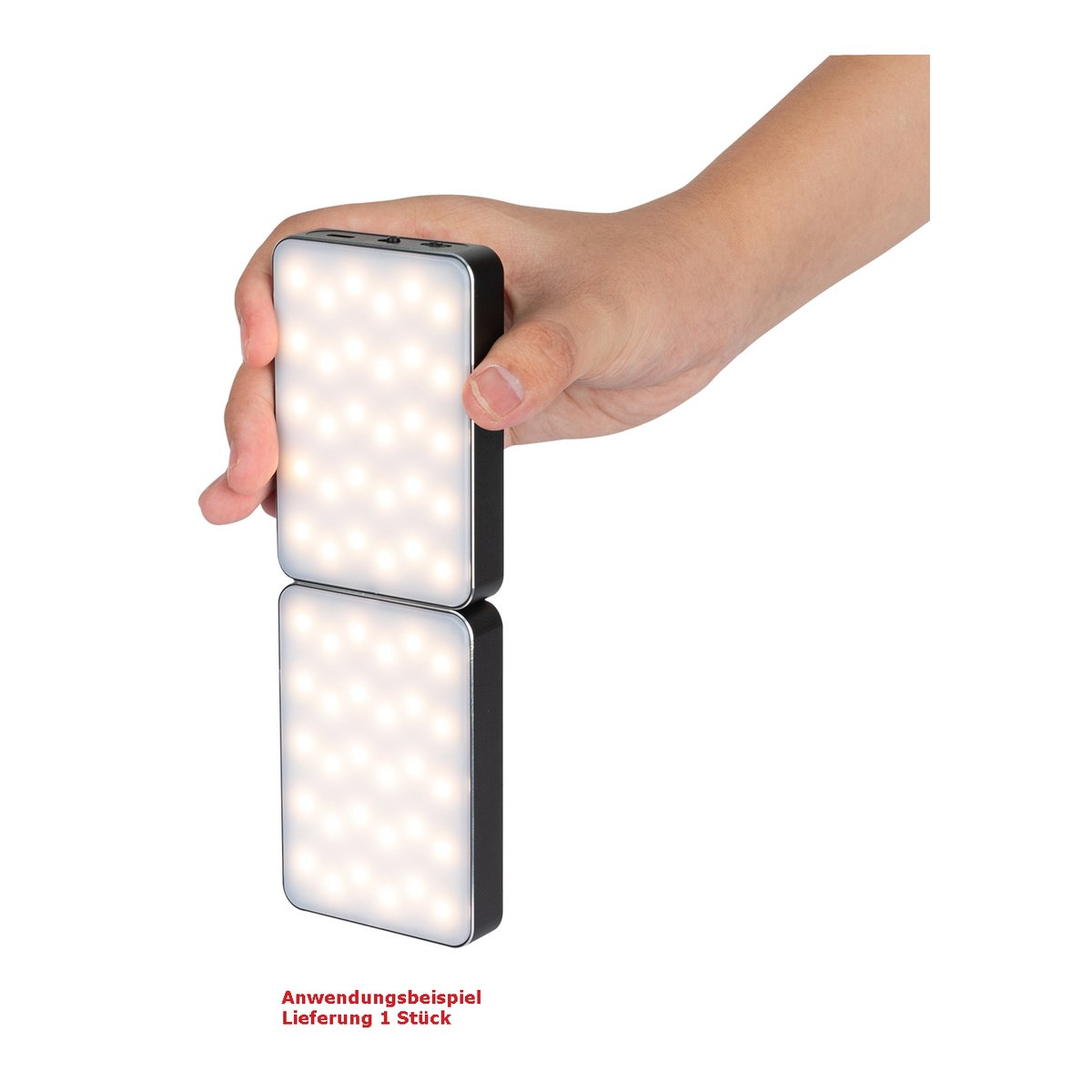 SmallRig 3290 RM75 RGBWW Videolicht - Anwendungsbeispiel: Eine Hand hält zwei miteinander verbundene, leuchtende LED-Panels.