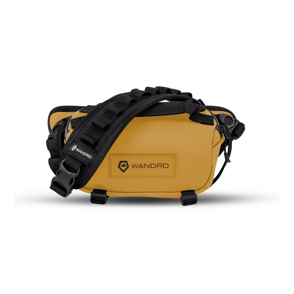 WANDRD ROGUE Sling 3L Dallol Yellow - Schrägansicht einer senfgelben Hüfttasche von WANDRD mit schwarzem Gurt.